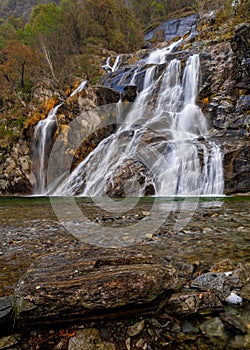 vertical view of the Cascata delle Sponde waterfall near Someo in the Ticino in Switzerland photo