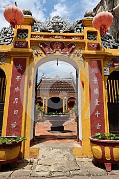 Vertical view of the door of the Hy Hoa temple in Hoi An, Vietnam