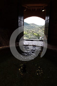 Vertical view. Entrance from the ablutions room of the 10th century mosque of Almonaster la Real. Huelva, Spain