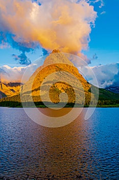 0000332 Vertical view of fiery clouds above Grinnell Point at Sunrise - Glacier National Park, Montana 5132 photo