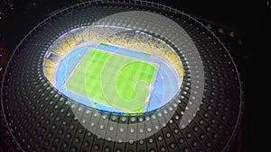 Vertical view of football field at beautiful stadium, aerial