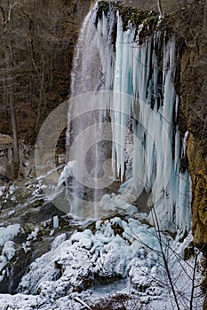 A vertical view of the frozen falling spring falls