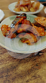 Vertical view of Gaji namul or marinated Gochujang eggplant as side dish