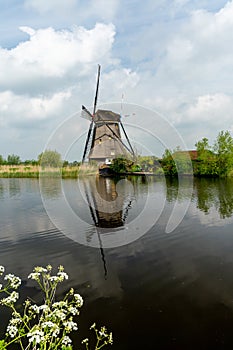 Vertical view of a historic 18-century windmill at Kinderdijk in South Holland