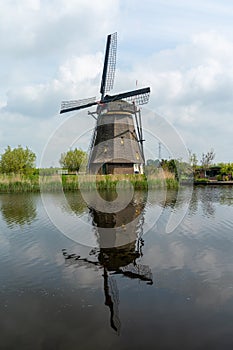 Vertical view of a historic 18-century windmill at Kinderdijk in South Holland