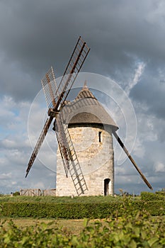 Vertical view of the historic windmill Moulin de Pierre in Hauville in Normandy