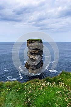 Vertical view of the landmark sea stack Downpatrick Head in County Mayo of Ireland