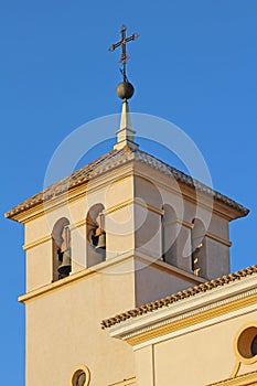 Vertical view of Parroquia de San Pedro Apostol En Calasparra building under the blue sky