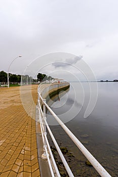 Vertical view of the riverfront promenade on the Rio Tinto River in downtown Huelva photo