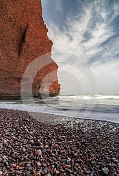 vertical view of the rocky beach at Legzira on the Atlantic Coast of Morocco