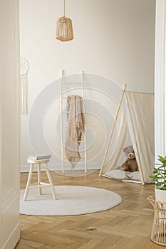 Vertical view of white scandinavian playroom
