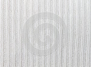 Vertical White Knitting or Knitted Fabric Texture Pattern Background