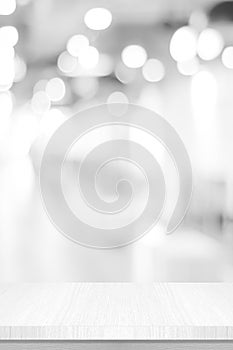 Vertical white table presentation, desk and blur background, Empty wood counter, shelf surface over blur restaurant white bokeh