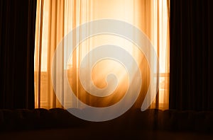 Vertical window curtains with dramatic light leak background photo