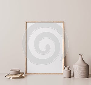 Vertical wooden frame mock up. Wooden frame poster, and simple vase on beige wall