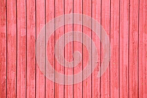 Vertical wooden laths with falu red paint photo