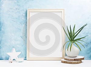 Vertical wooden Photo frame mock up with plants in vase, ceramic decor on shelf. Scandinavian style