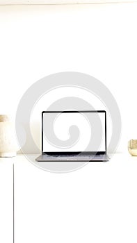 verticale photo of a laptop on a white background photo