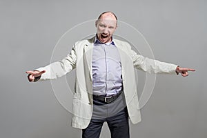 Very angry businessman shout portrait