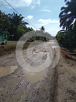 very bad road, in front of the house