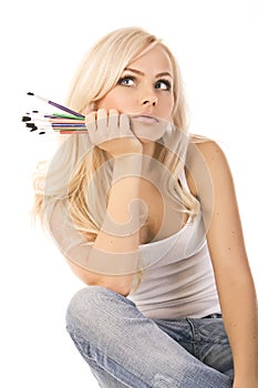 Very beautiful blonde with of colored pencils