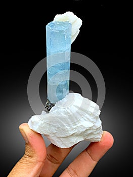 very beautiful deep blue aquamarine with microcline feldspar matrix mineral specimen from shigar valley Pakistan photo