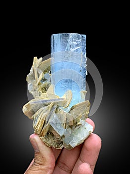 very beautiful deep blue aquamarine with microcline feldspar matrix mineral specimen from shigar valley Pakistan photo