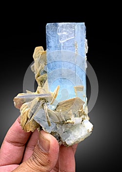 very beautiful deep blue aquamarine with microcline feldspar matrix mineral specimen from shigar valley Pakistan photo