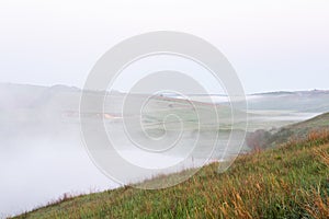 Very beautiful landscape with fog and green nature in the Republic of Moldova. Rural nature in Eastern Europe