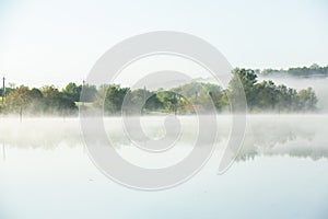 Very beautiful landscape with fog and green nature in the Republic of Moldova. Rural nature in Eastern Europe