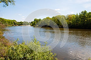 Very beautiful natural landscape in Ukraine. Sky, water and forest in summer or spring. Desna river in the city of Chernihiv