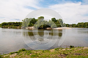 Very beautiful natural landscape in Ukraine. Sky, water and forest in summer or spring. Desna river in the city of Chernihiv