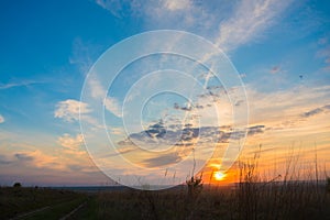 Very beautiful summer sunset with bright colors of the sky