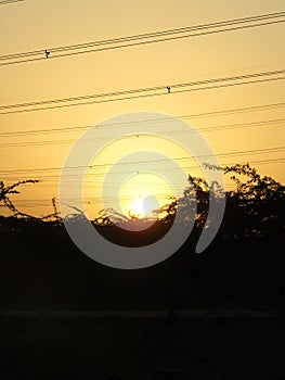 Very beautiful sun set and electric cabal. photo