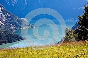 Very beautiful view of the mountain on the blue water of the fjord and mountains in Norway in the summer