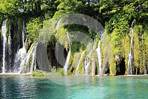 Very beautiful waterfall - water flows from the cliff. Croatia photo