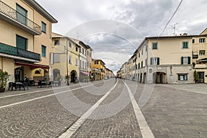 The very central Corso Giacomo Matteotti in a moment of tranquillity, Cascina, Pisa, Italy photo