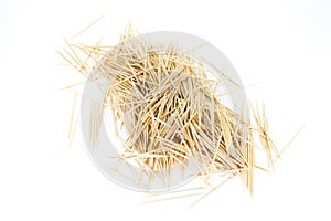 A very chaotic pile of toothpicks, isolated on white background