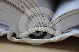 Very closeup macro flyleaf of the white notebook