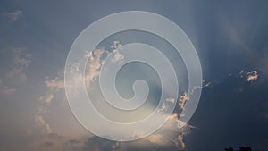 Very cloudy sky shine radiate