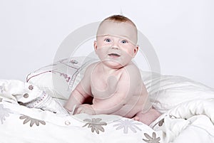 Very Cute Baby Boy on Duvet