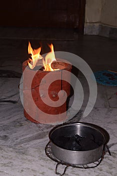 Very cute and beautiful home made burning coal chulha, koyla ka chulha, coal shegadi, charcoal stove, mitti ka chulha, charcoal photo