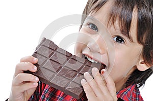 Very cute kid with chocolate