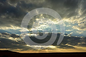 A very dramatic cloudscape with sun rays