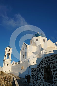 Very famous Anastasis Church with blue domes in Santorini photo