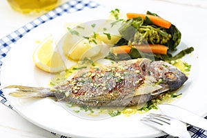 Very fresh seabream fish grilled with turnip greens