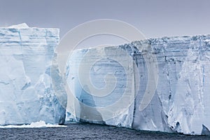 Very high walls of icebergs