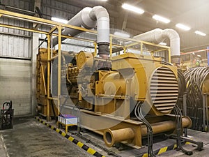 A very large electric diesel generator in factory for emergency,equipment plant modern technology industrial