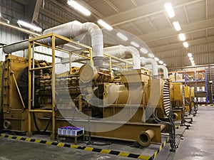 A very large electric diesel generator in factory for emergency,equipment plant modern technology industrial