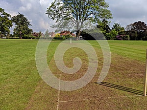 A very muddy school cricket strip